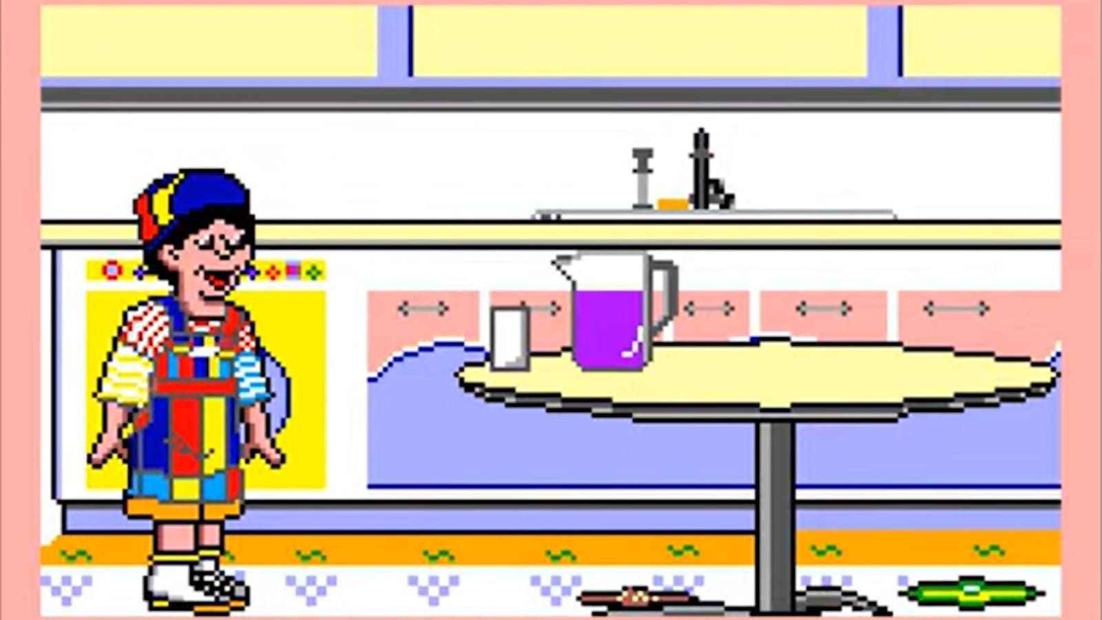 Cena pixel‑art com personagem de roupa multicolorida em cozinha. À direita há mesa com jarra de líquido roxo e copo branco. Ao fundo, armários, pia e objetos sobre o balcão. O chão tem padrão geométrico e pequenos itens aparecem perto da mesa.