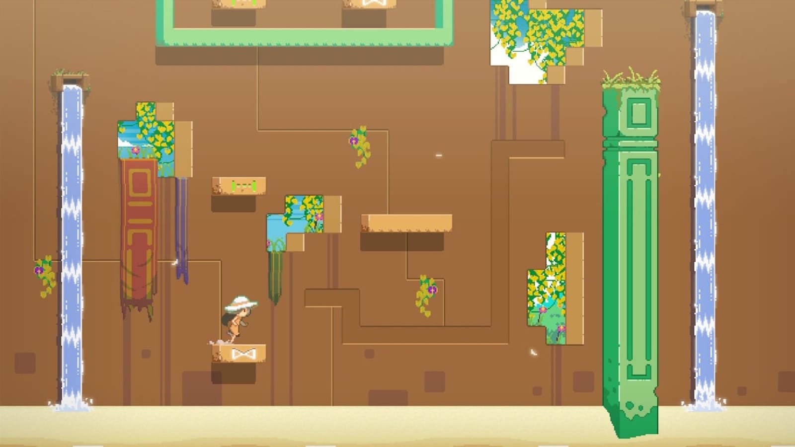 Pixel art mostrando personagem de chapéu branco em pequena plataforma diante de parede marrom com padrões geométricos. Plataformas com plantas e flores cercam duas quedas d’água laterais que descem até área clara semelhante a areia.