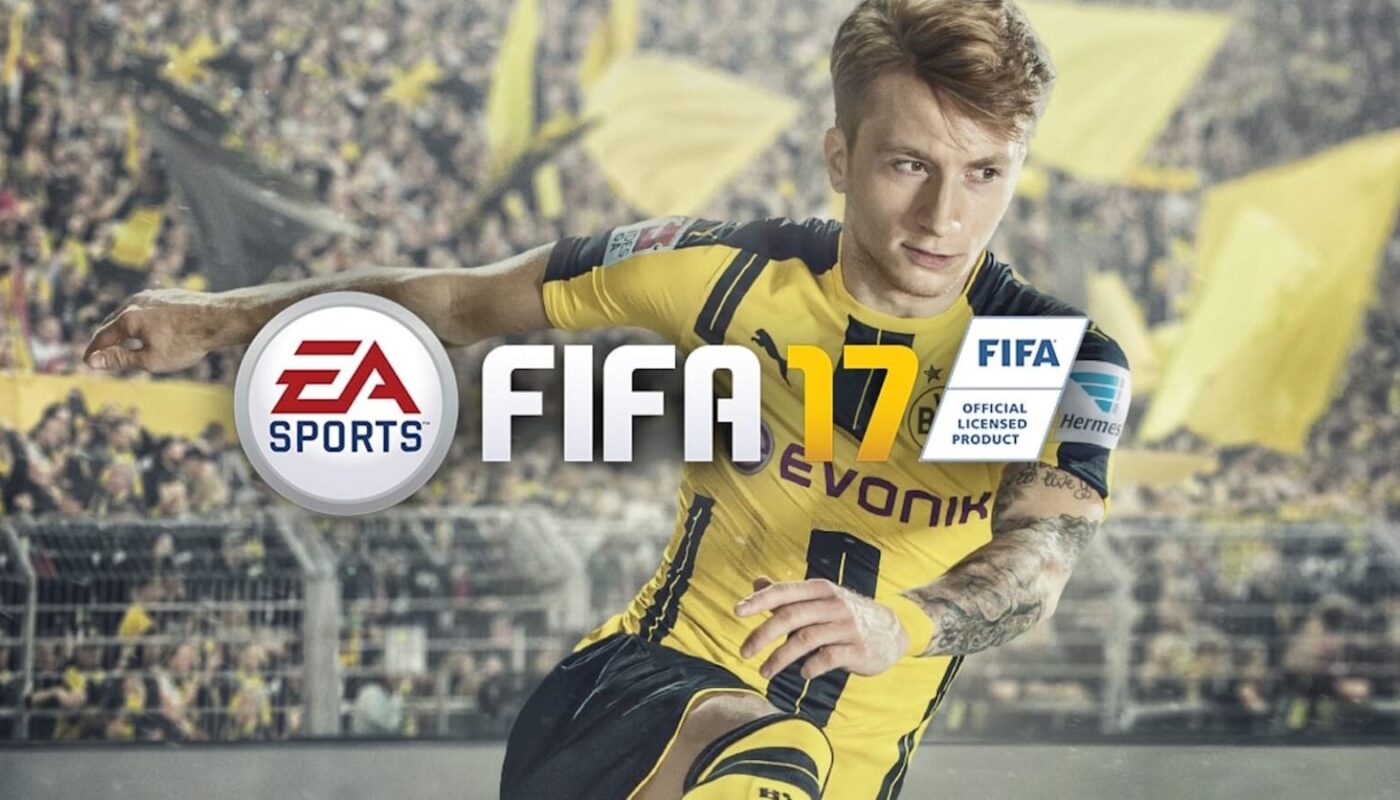 Capa de FIFA 17 mostrando jogador com uniforme amarelo e preto do Borussia Dortmund em estádio cheio de bandeiras amarelas. Logo EA Sports e título ‘FIFA 17’ aparecem à frente.