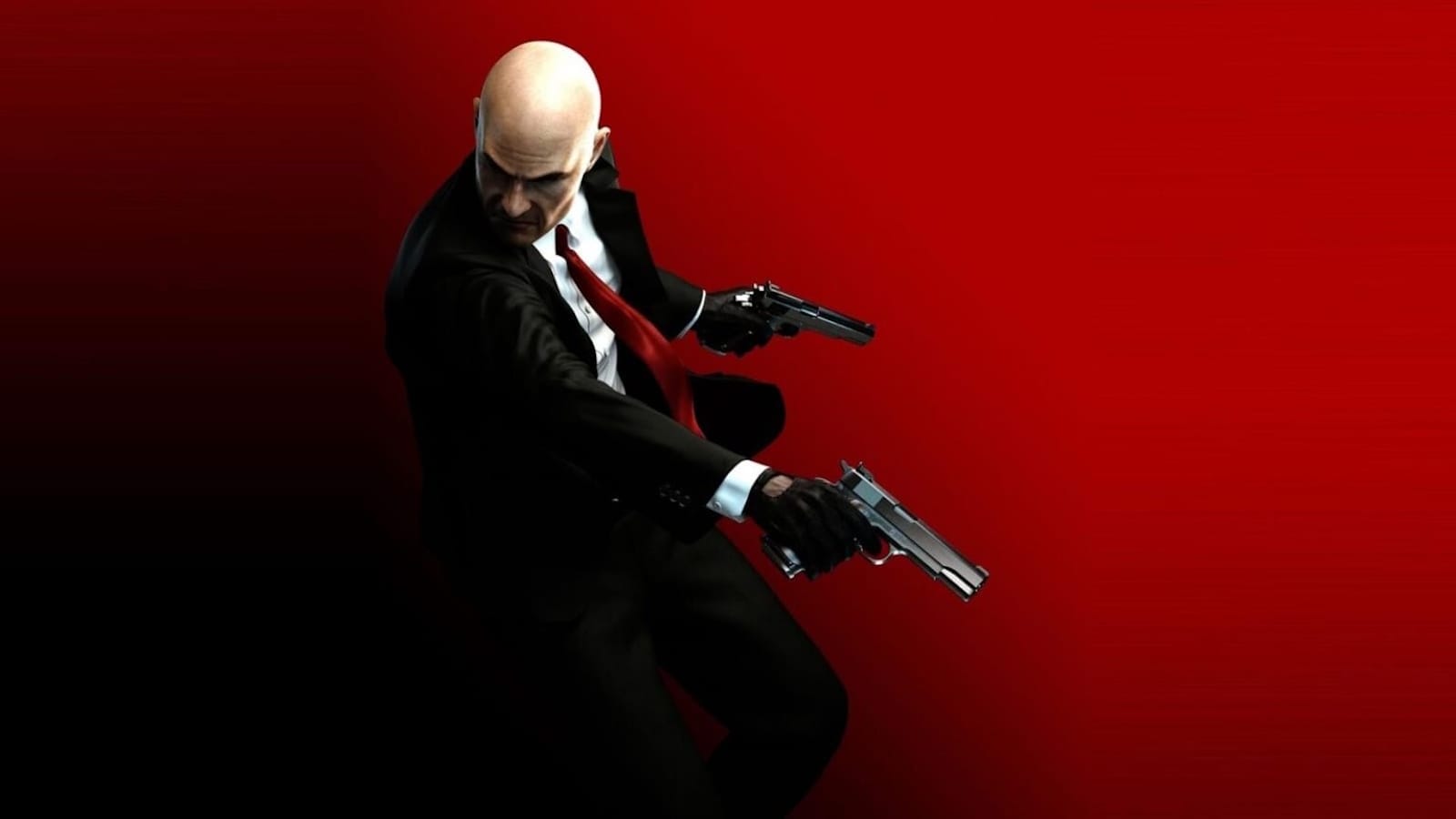 Homem careca de terno preto, camisa branca e gravata vermelha em pose de ação segurando duas pistolas diante de fundo vermelho.